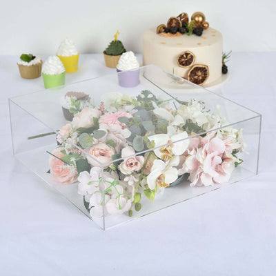 Acrylic box displaying a floral arrangement with pastel flowers.