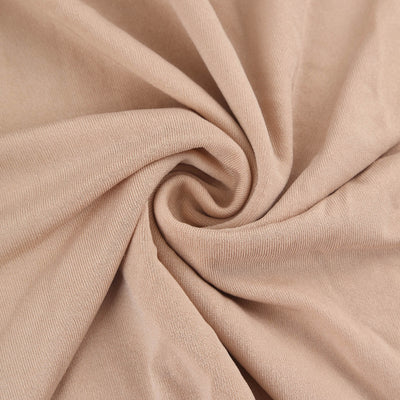 Close-up of soft beige fabric texture.