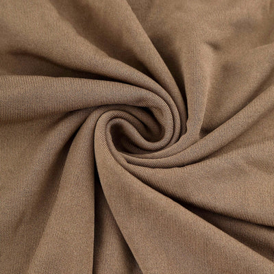 Brown fabric texture in a swirling pattern.