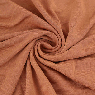 Textured brown fabric swirl, showcasing soft material and rich color.
