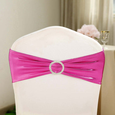 Pink satin chair sash with rhinestone buckle for elegant decor.