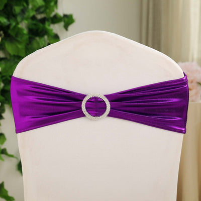Purple chair sash with rhinestone buckle for event decor.