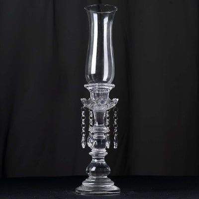 Elegant glass candle holder with crystal accents, showcasing a vintage design.