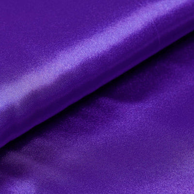 Purple satin fabric with a smooth, shiny texture.