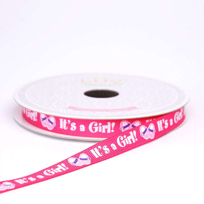 Pink "It's a Girl!" ribbon on a roll for baby shower decorations