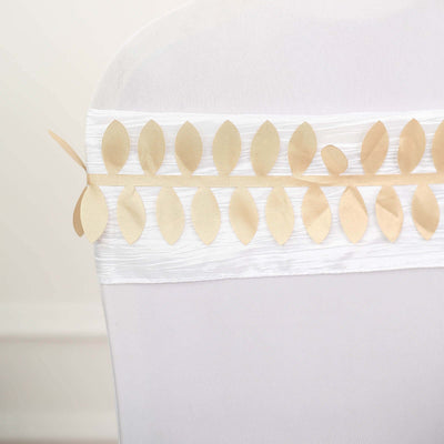 Gold leaf chair sash decoration for events and weddings.