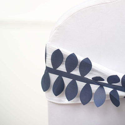 Navy leaf-pattern chair sash on a white chair