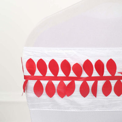 White chair cover with red leaf design trim