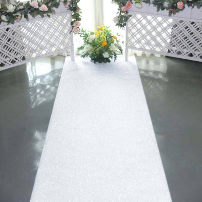 Wedding aisle with floral arrangements and a bright, inviting atmosphere.