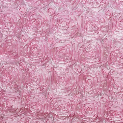 Pink rose-patterned fabric with textured floral design.