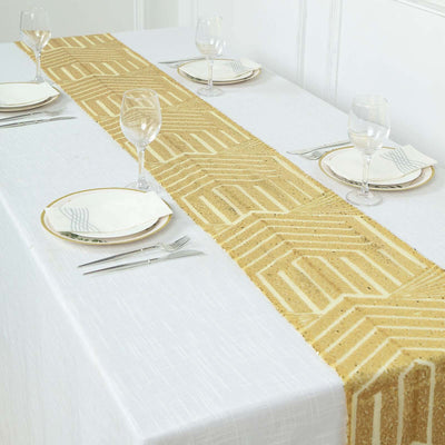 Elegant gold table runner on a white table setting with plates and glassware.