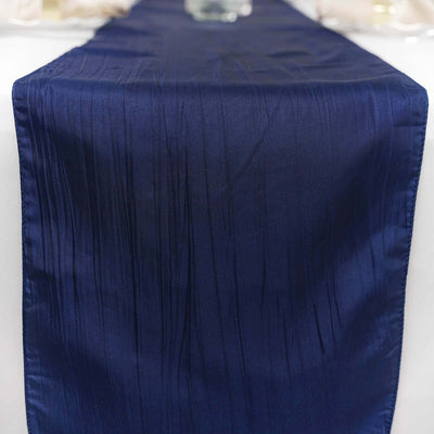 Navy blue table runner with a textured finish on a white background.