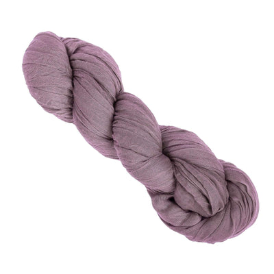 Purple textured yarn bundle on white background