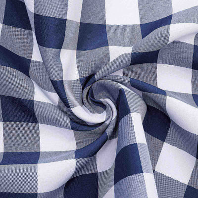 Navy and white checked fabric with a swirling pattern.