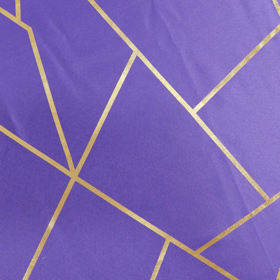 Purple fabric with gold geometric patterns.