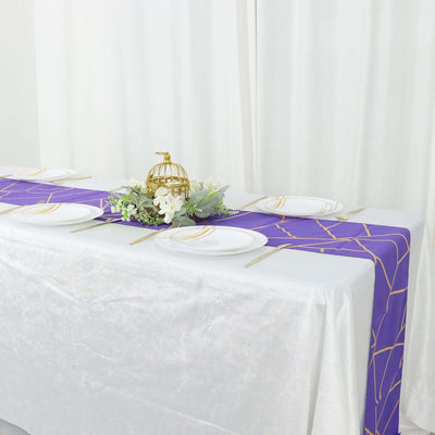 Elegant purple table runner with geometric design, styled for a dining setup.