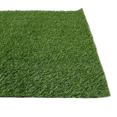 Artificial green grass turf on a white background