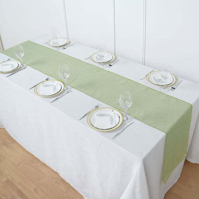 Elegant green table runner on a white table setting with plates and glasses.