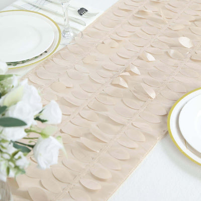 Elegant beige table runner with leaf design on a dining table.