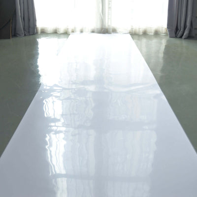 Glossy white runway on polished floor with natural light