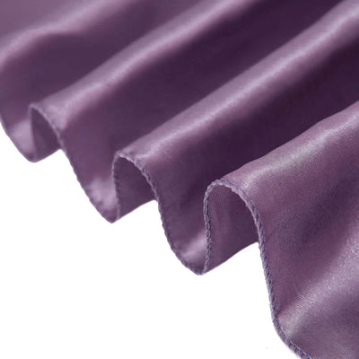 Purple silk fabric with soft, flowing waves.