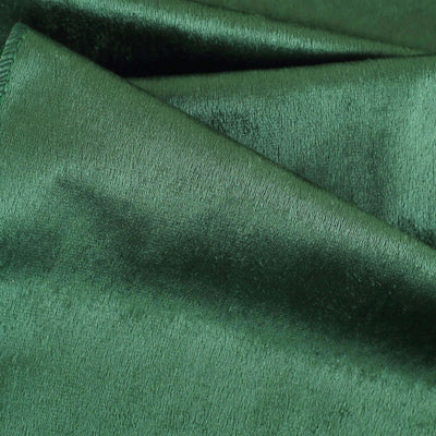 Green satin fabric with a smooth, shiny texture.