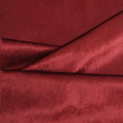 Luxurious red velvet fabric with a soft sheen and rich texture.