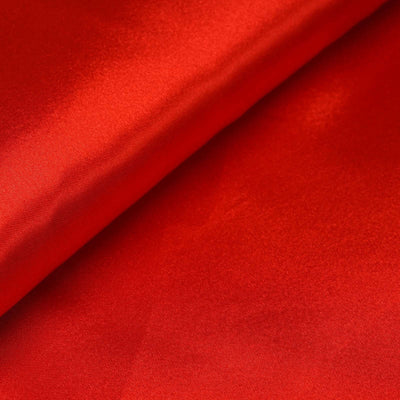 Red satin fabric draped smoothly, showcasing its glossy texture.