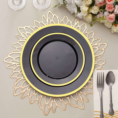 Elegant black plate with gold rim on decorative charger