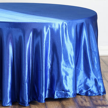 Add Elegance to Your Event with the Royal Blue Seamless Satin Round Tablecloth