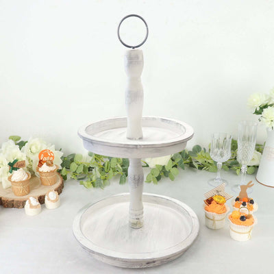 Two-tiered wooden serving stand with a handle, ideal for desserts and snacks.
