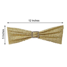 A champagne Metallic Shimmer Tinsel Spandex bow with a rhinestone buckle measures 12 inches