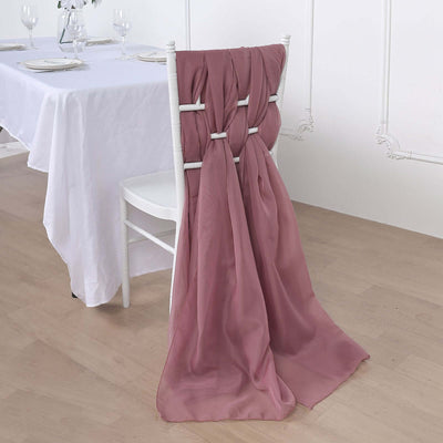 Elegant dusty rose chair cover draping for weddings and events.