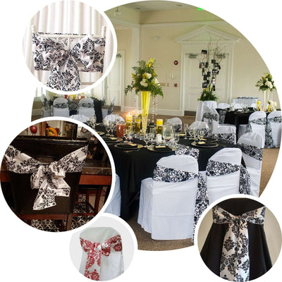 Elegant chair sashes in black and white floral design for event decor.