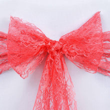 Red lace bow on a white background
