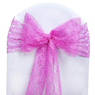 Pink lace chair sash bow on a white chair cover