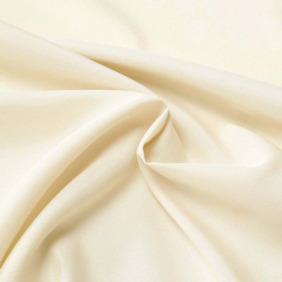 Cream-colored fabric with soft texture and drape.