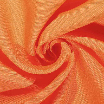 Bright orange fabric with a soft texture, perfect for various sewing projects.