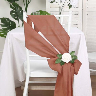 Rustic brown chair sash with rose and leaves decoration