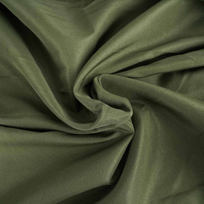 Olive green fabric texture with soft draping folds.