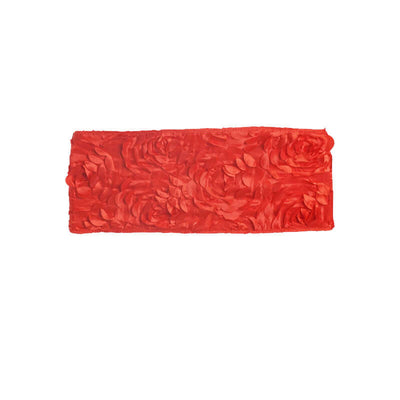 Red floral decorative table runner on a plain background