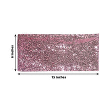 Glittering pink sequined table runner with measurements on a white background