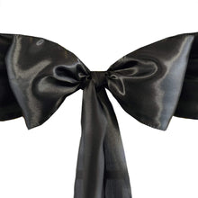A black satin bow on a white background#whtbkgd