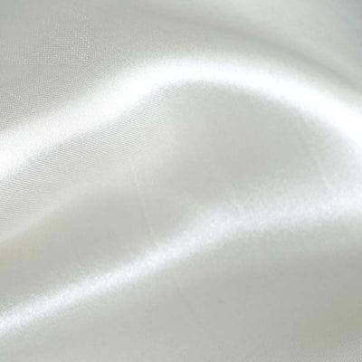 Smooth white satin fabric with a subtle sheen.