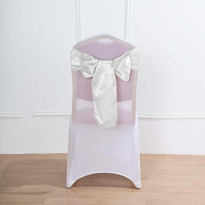 Elegant chair cover with satin bow, perfect for events and weddings.
