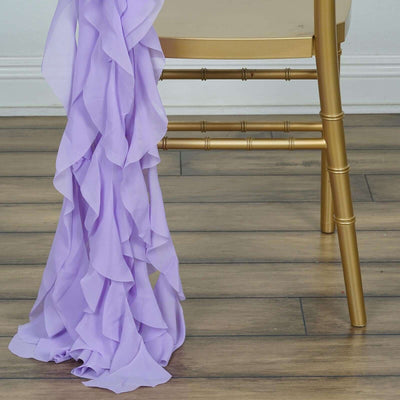 Lavender ruffled fabric draped over a gold chair leg.