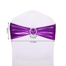 A fitted spandex chair sash in purple with a rhinestone ring on it