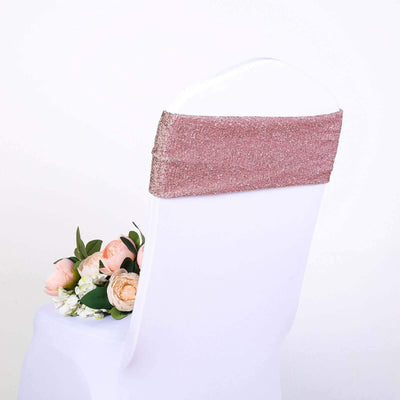 Rose gold chair sash with floral arrangement on a white chair
