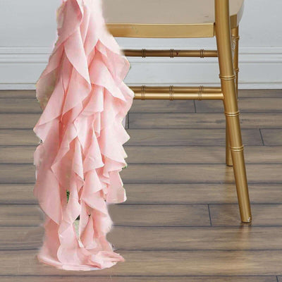 Pink ruffled fabric draped gracefully over a chair leg.