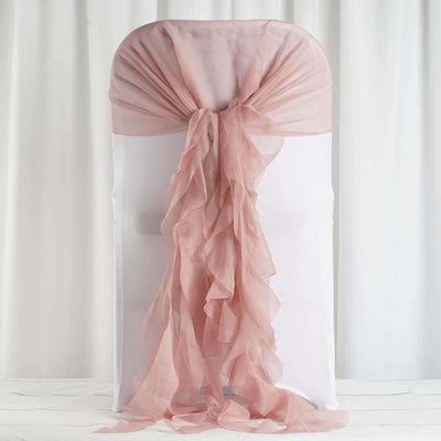 Pink chiffon chair sash draped elegantly on a white chair